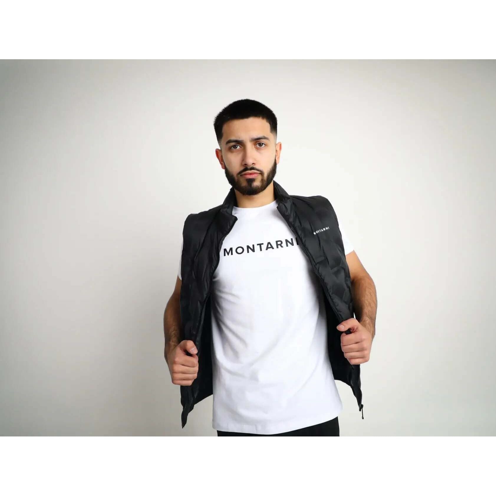 Gilet Puffer Jacket in Noir Black worn by a model showcasing modern style and comfort.