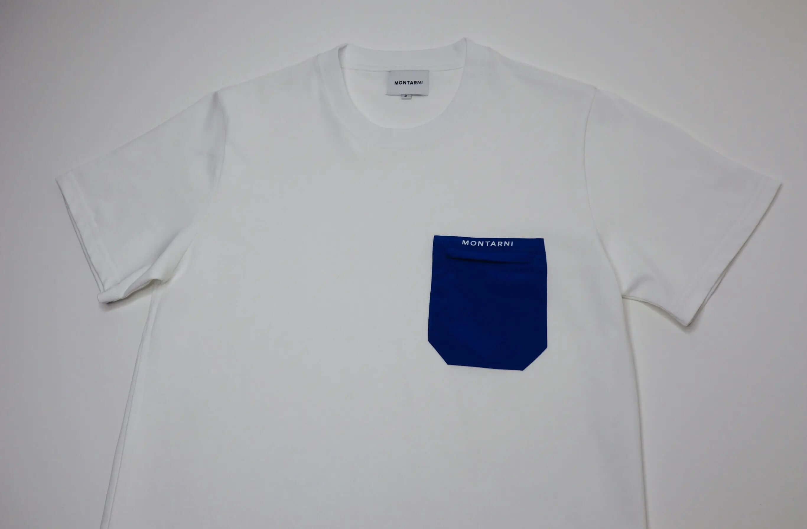 Montarni white utility pocket t-shirt with blue zip chest pocket and logo on premium cotton tee