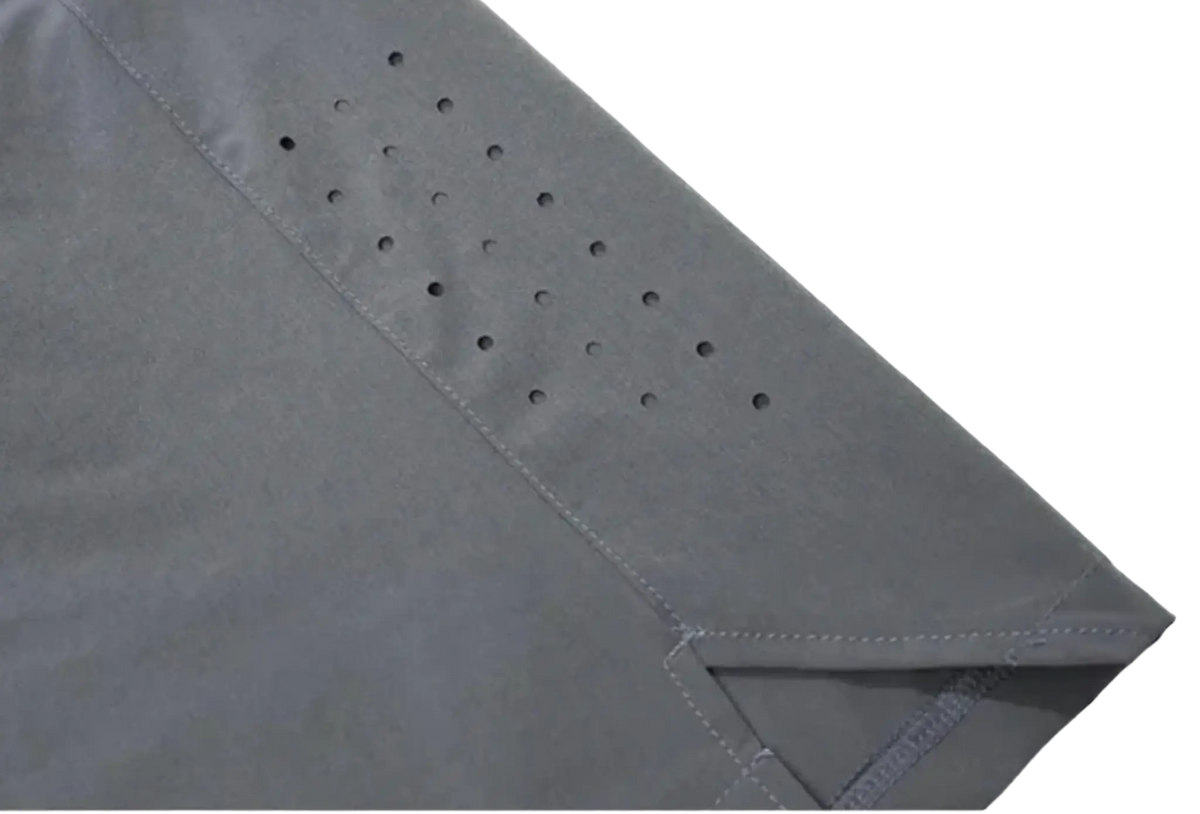 Close-up of the Activewear Short’s in grey featuring breathable perforation for optimal comfort.